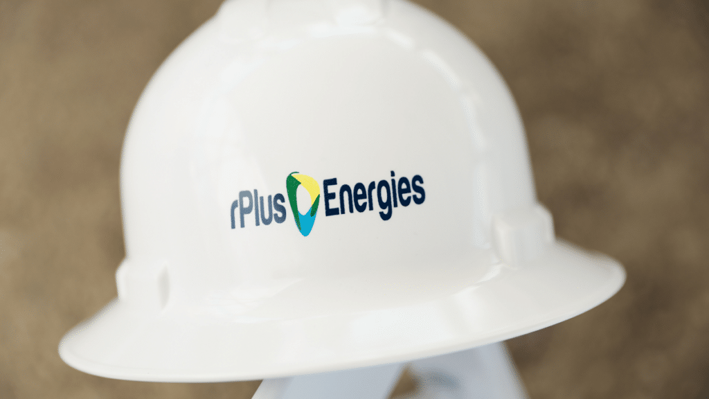 close up of hardhard with rPlus Energies logo on the front