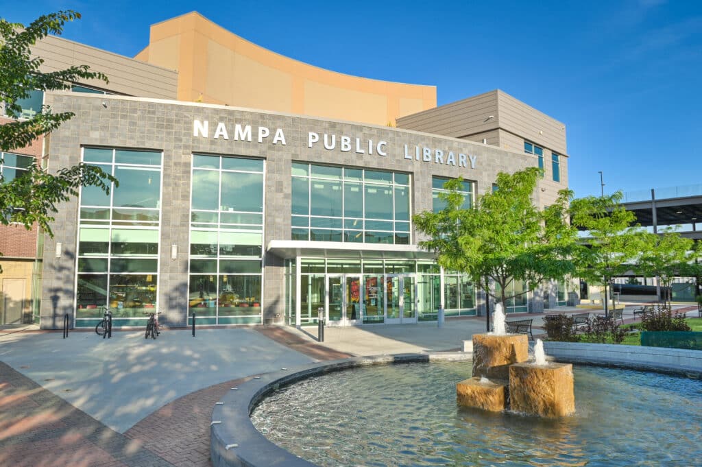 Exterior view of Nampa Public Library Square, with fountain in the front
