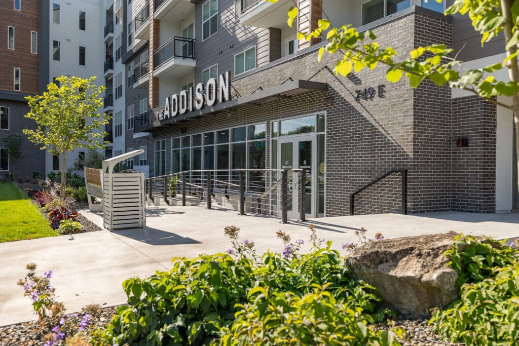Exterior of Addison multifamily development, front entry