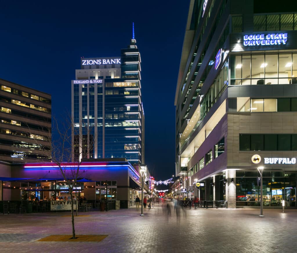 Exterior view of 8th & Main building and surrounding buildings, nighttime
