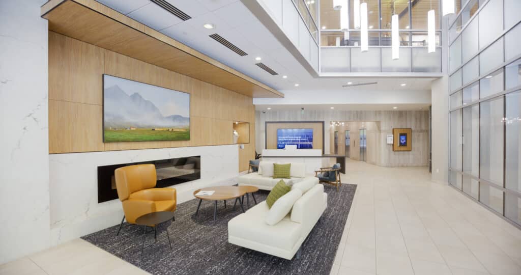 Interior view of 8th & Main building, reception desk and front lobby