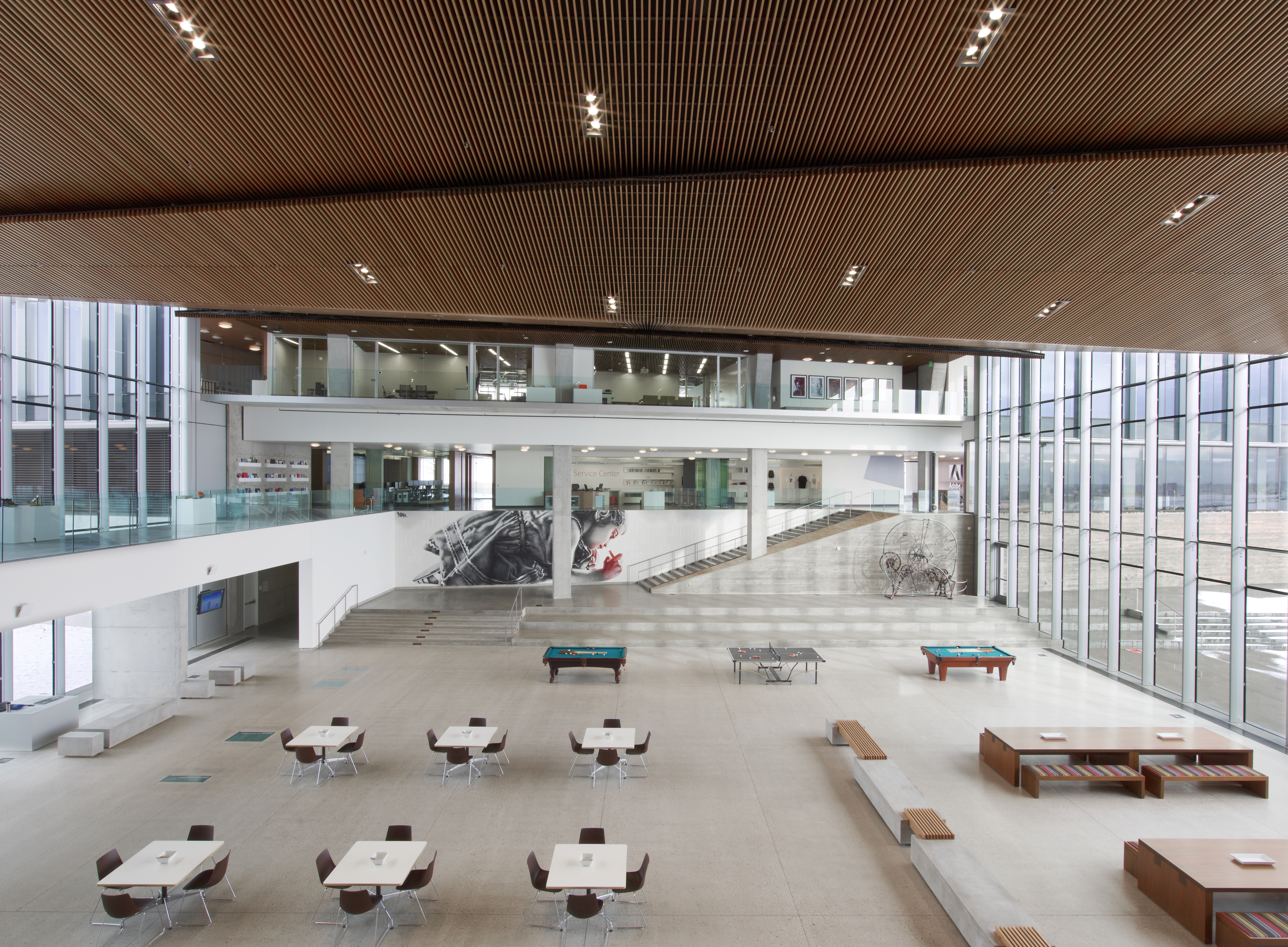 Interior view of Adobe building, large open seating and recreation area