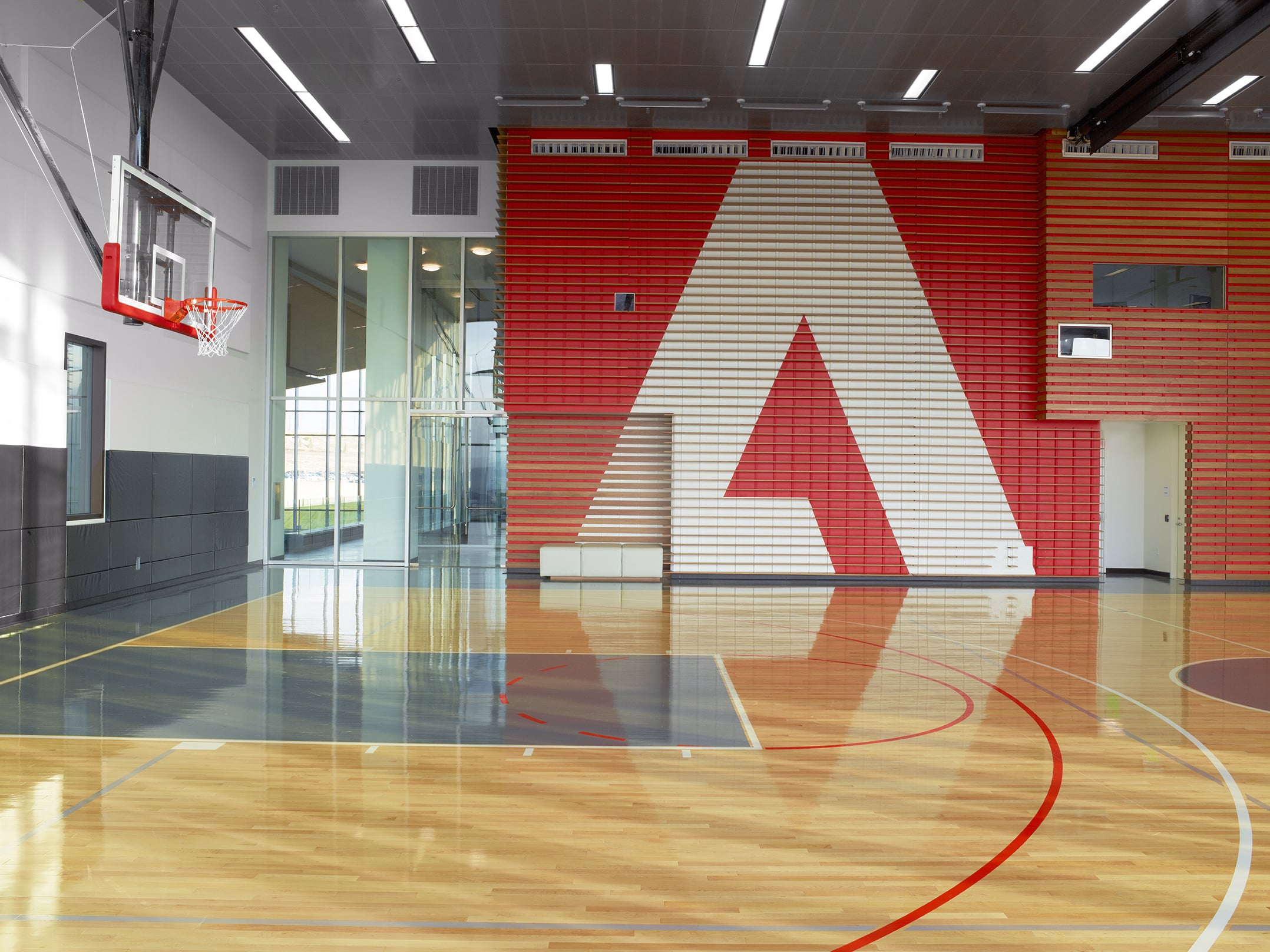 Interior view of Adobe building, indoor basketball court