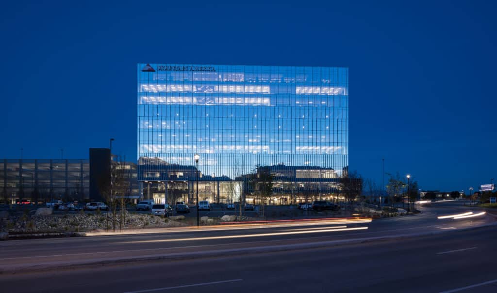 Exterior of Mountain America Credit Union building, nighttime