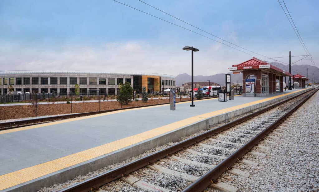 Exterior of Overstock building from nearby TRAX station, daytime
