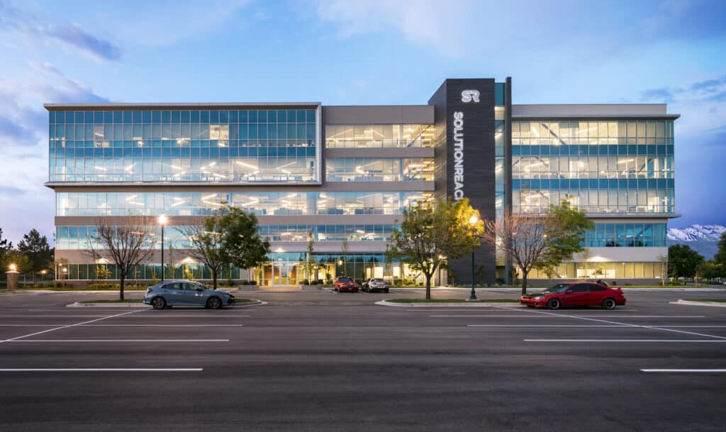 Exterior of Solution Reach building and parking lot