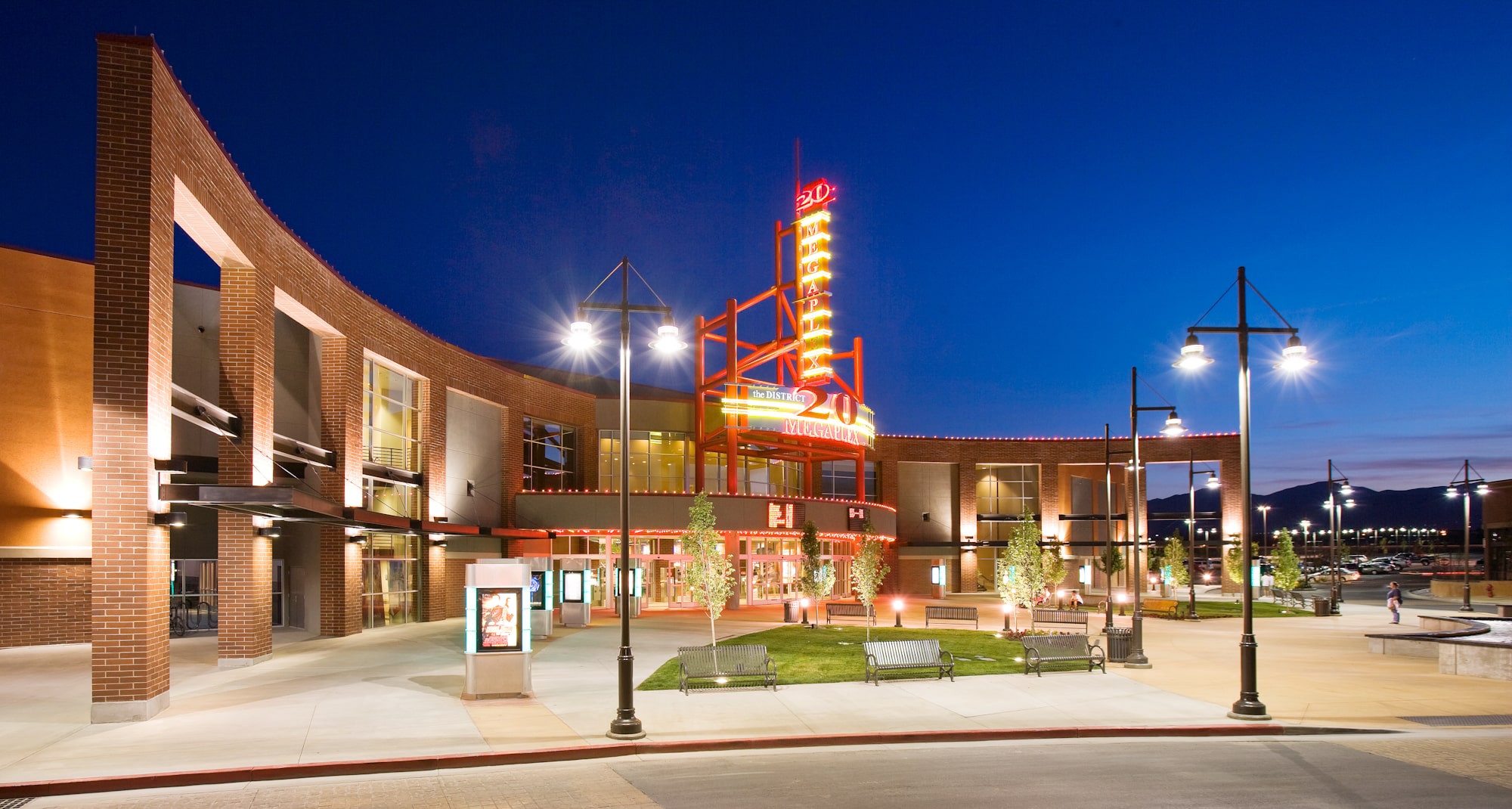 Exterior of The District at night, Megaplex 20 theatres
