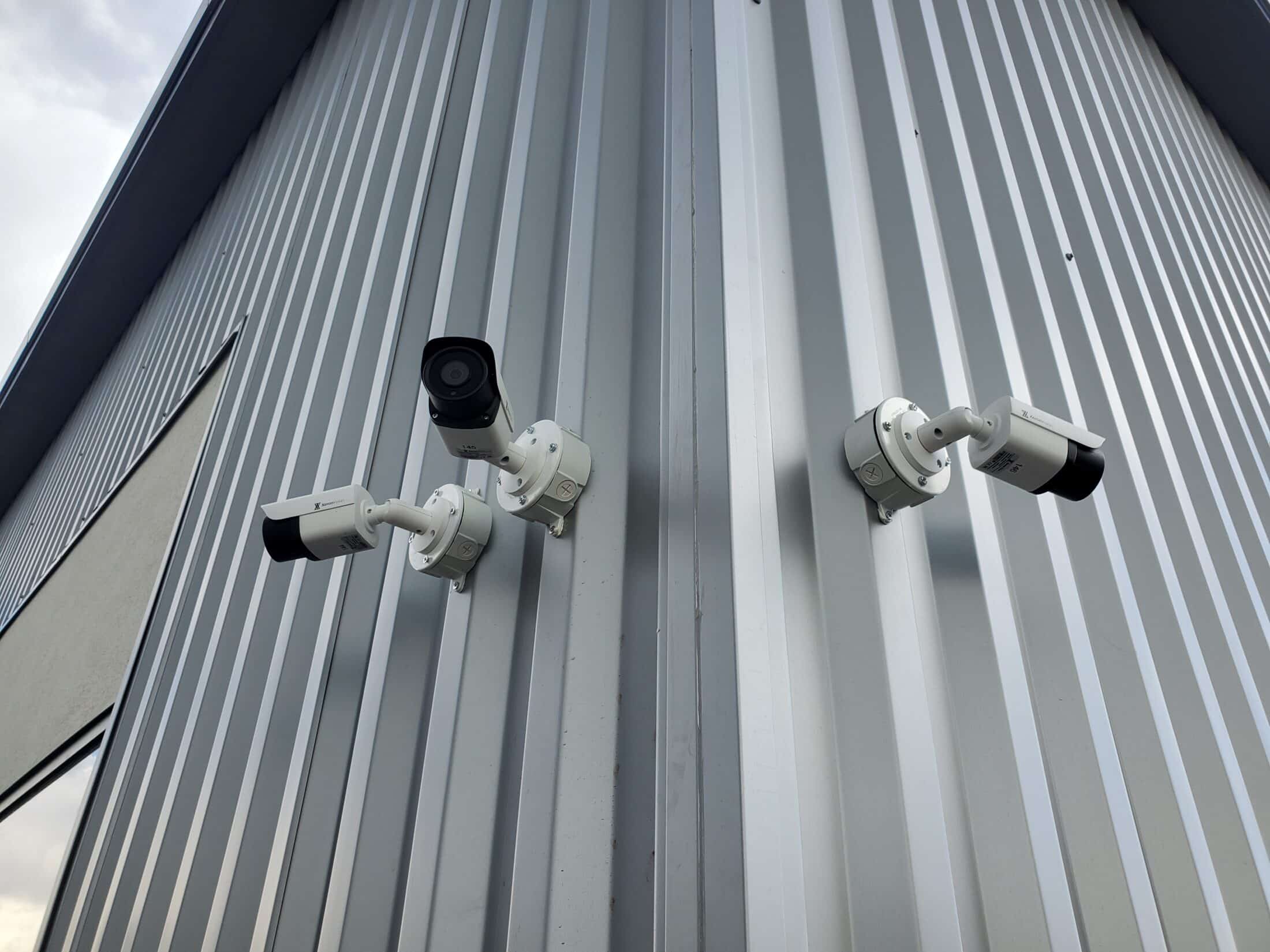Security cameras mounted on exterior of Storage Unit building